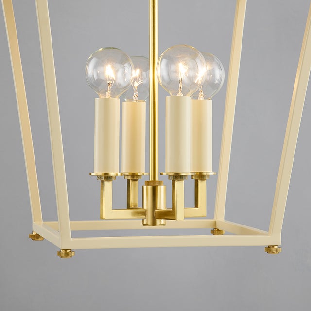 Natick is clean, open, and airy. The double roofline stands out from a traditional lantern, while the Aged Brass metal...