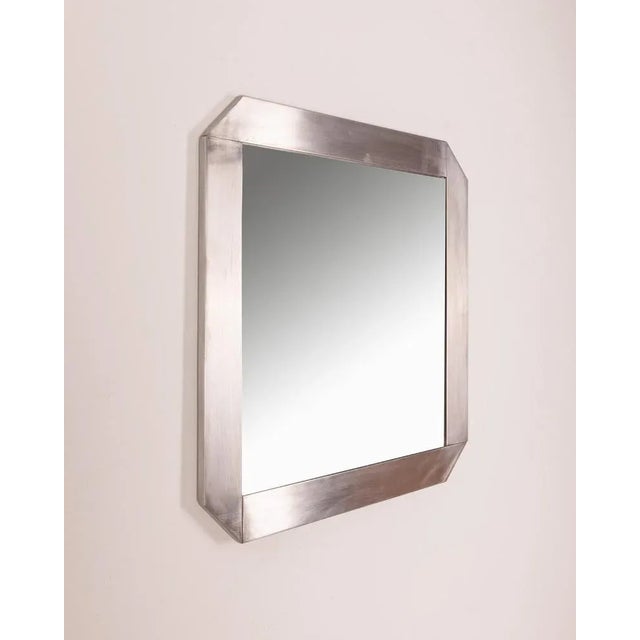 Wall mirror with chromed metal frame, Gaetano Sciolari design for Valenti, 70s. Conditions: in good condition, it presents...