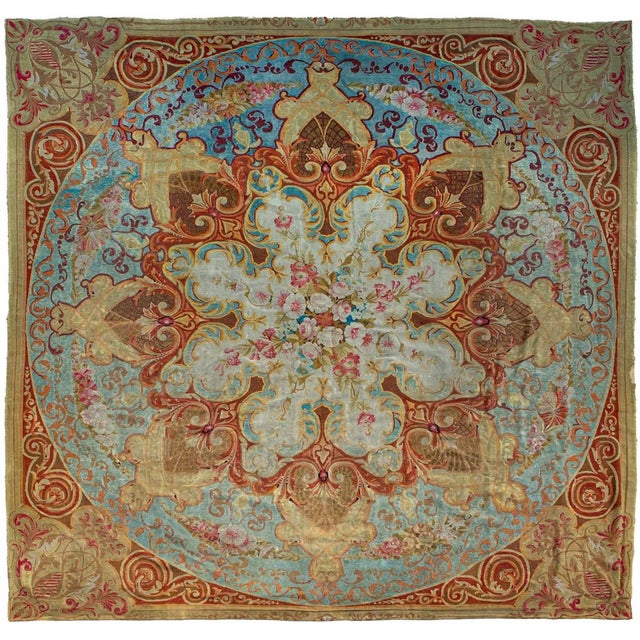 Handwoven in wool, this 11x11 circa 1870-1900, antique French Aubusson rug is a striking example of late 19th-century...