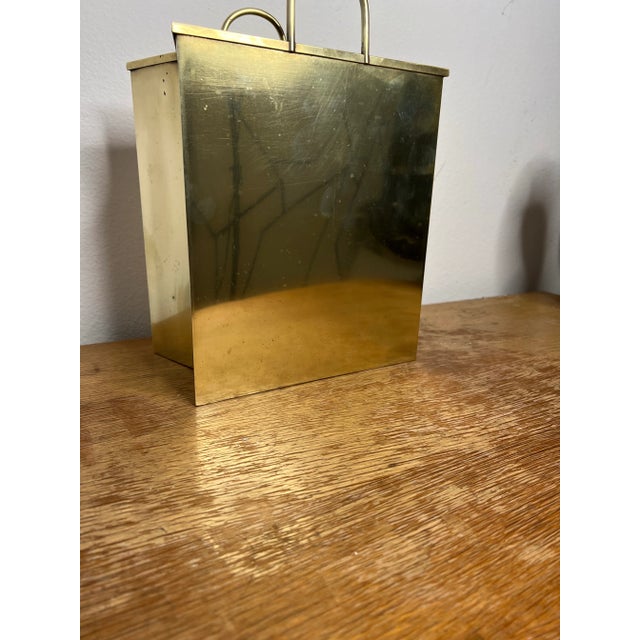 Stunning, Italian magazine holder made of naturally patinaed brass. Made in the style of famed Italian designer Gio Ponti....