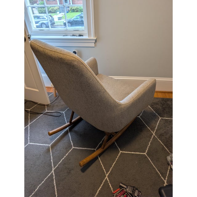This is the SAIC Quantam Rocking Chair, an exclusive collaboration between CB2 and the School of the Art Institute of...