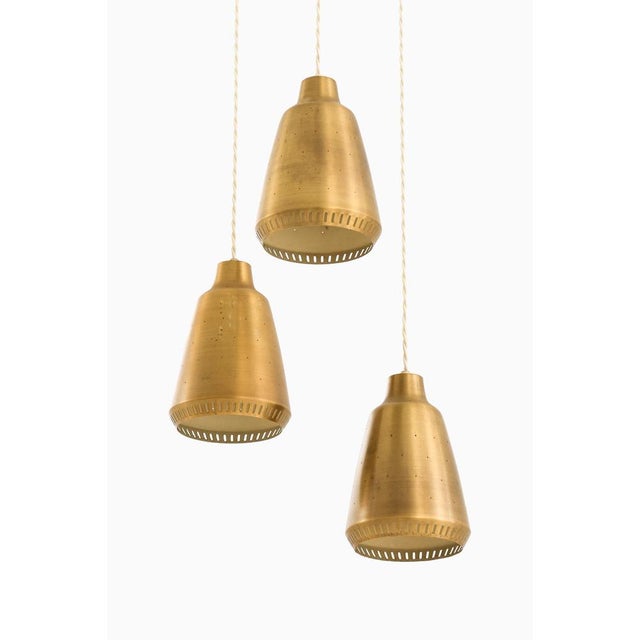 This rare ceiling lamp, crafted in the style of hans bergström, was produced in sweden during the 1950s, exemplifying the...