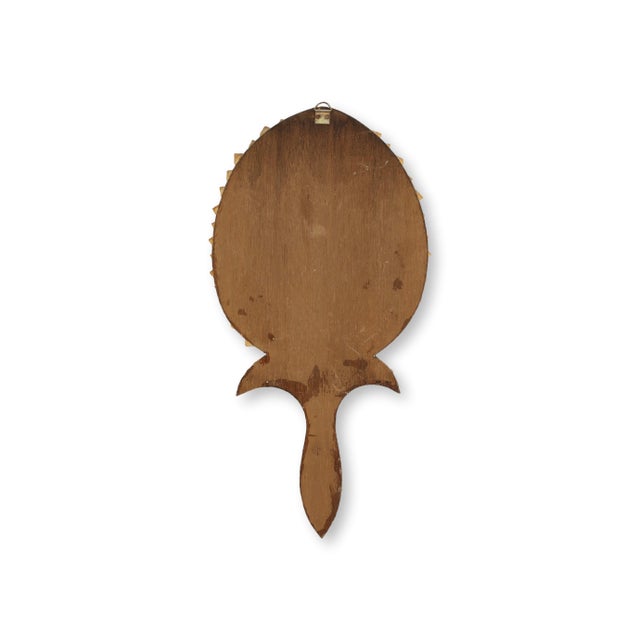 Charming early 20th century French seaside souvenir hand mirror decorated with an intricate arrangement of natural shells...