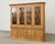 Large 19th century country English pine bibliotheque or bookcase cabinet made in the George III taste. The bookcase...
