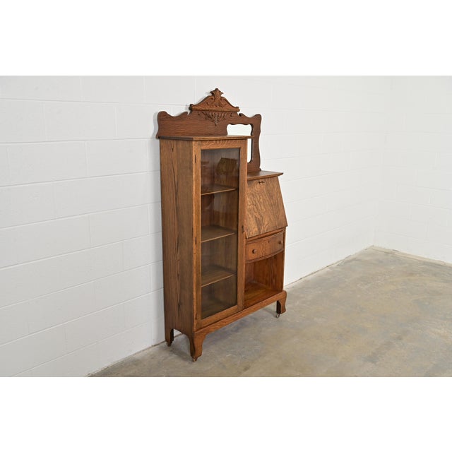 Larkin & Co. Antique Victorian Carved Tiger Oak Side-by-Side Bookcase With Drop Front Secretary Desk by Larkin Co., Circa 1900 For Sale - Image 4 of 16