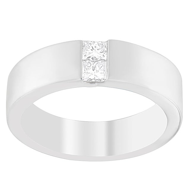 This stunning 14 karat white gold Ring has massive princess cut diamonds embedded right at its center. This will...