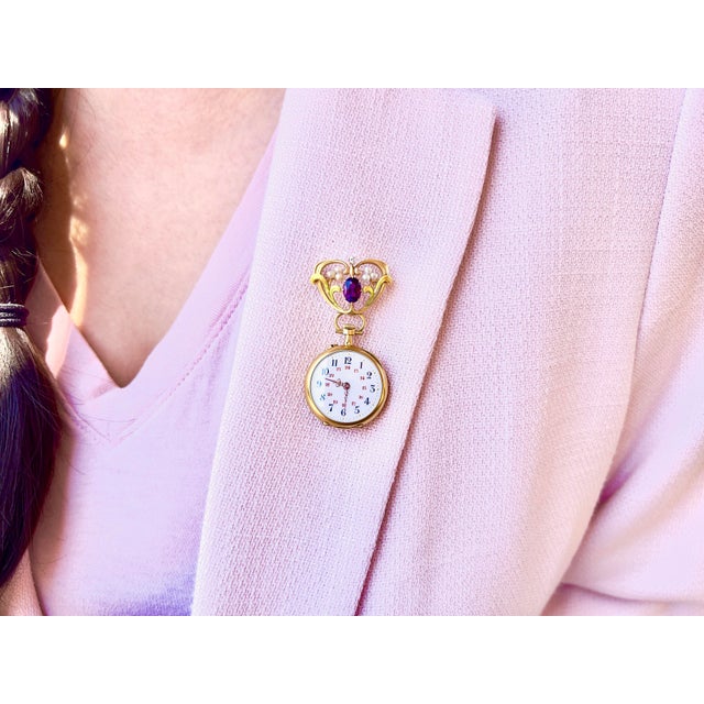 About This Brooch: This antique Art Nouveau brooch features a stunning amethyst and an old European cut diamond, adorned...