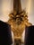 This beautiful wall lamp was produced in Belgium, it is made of light synthetic foam and gilded by hand and is visually...