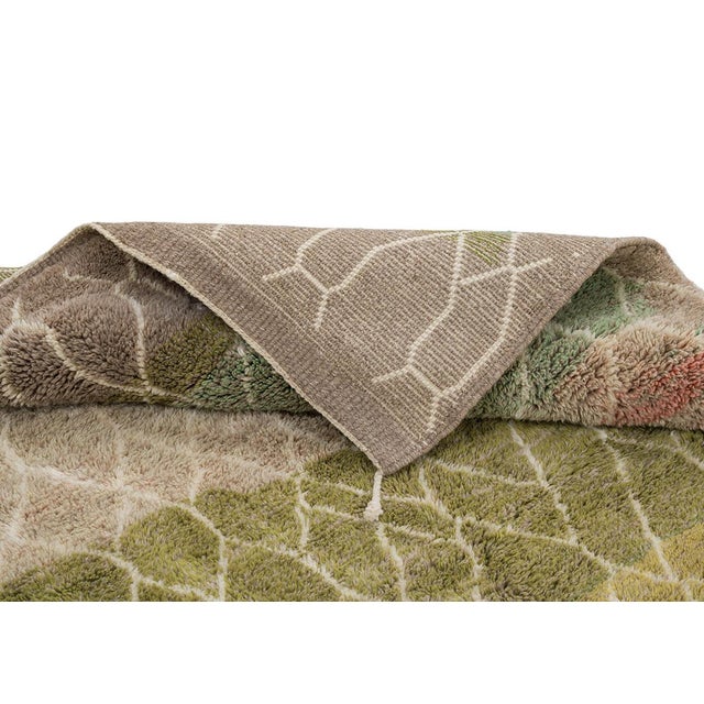 A patchwork of landscapes beneath a web of light: color and pattern in joyful layers. A continuous ivory honeycomb lattice...