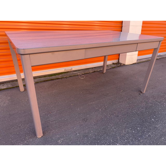 Vintage mid century modern metal tanker desk table with middle drawer for storage in the style of Steelcase, some scuffs...