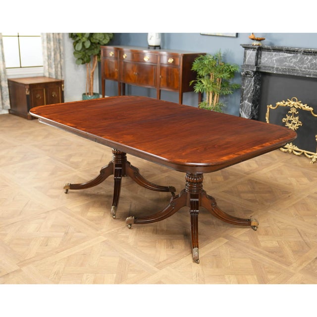 From Niagara Furniture a large size Vintage Old Colony Furniture Mahogany Dining Table with three extension boards in...