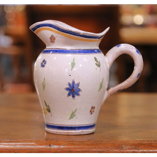 Pair of 19th Century French Quimper Faience Jugs With Breton Figures and Floral For Sale - Image 9 of 13