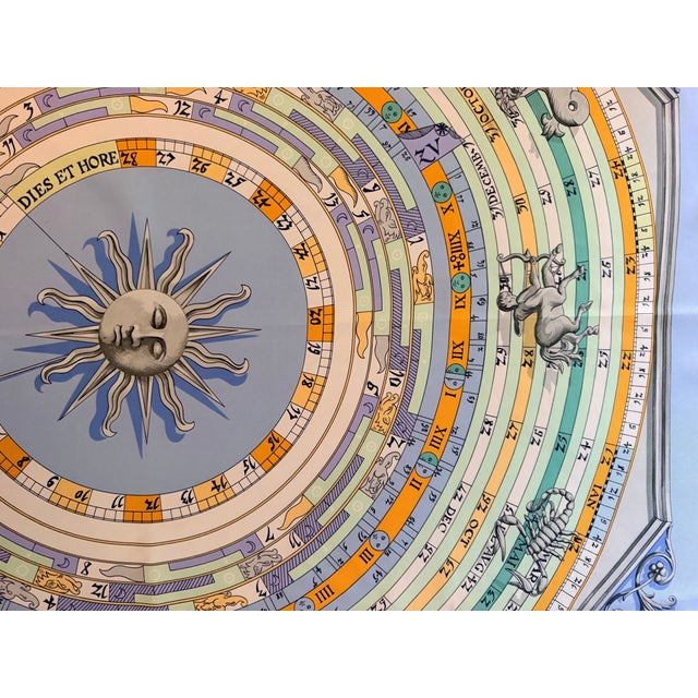 Hermès "Dies et Horae" This silk scarf features a Renaissance-style celestial map illustrating the paths of the sun, the...