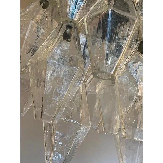 Luxury chandelier made in murano glass with champagne poliedri and brunito finishing. a jewel of italian hand-...