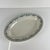 Oval earthenware platter, "Laurels" pattern, by Moulins des Loups - Hamage, 1900 Dimensions: 31.5 x 22 cm Height: 4 cm...