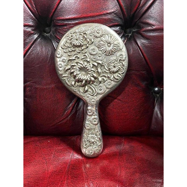 Antique Japanese Repoussé Vanity Hand Mirror Material: Metal, Mirror Glass An attractive 20th century Japanese vanity hand...