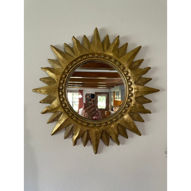 An absolutely stunning French Style Gilded Sunburst Wall Mirror ready to be hung and enjoyed. Circa 1960s. This fabulous...