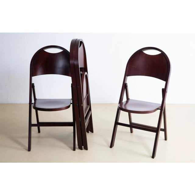 Set of 4 Tric folding chairs by Achille and Pier Giacomo Castiglioni produced by BBB Emmebonacina in the 1960s. The chairs...