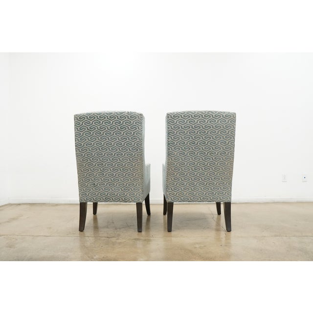 The Larkin host chair draws inspiration from Belgian design, featuring slim architectural lines, subtle short wings, and...