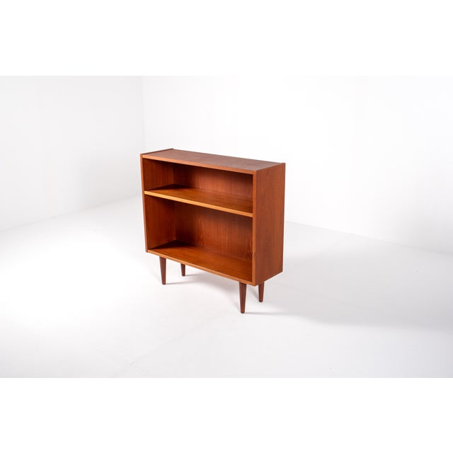 This authentic Mid-Century Modern teak bookcase was crafted in Denmark by Sejling Skabe, a respected Danish furniture...