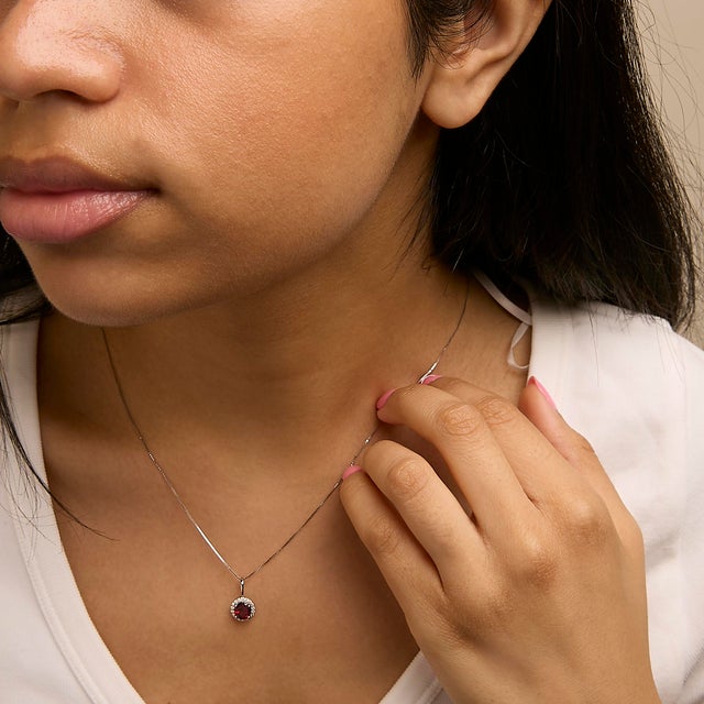 10K White Gold Red Garnet and 1/10 Cttw Diamond Accent Halo Pendant Necklace For Sale - Image 4 of 5