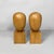 Italian postmodern stylized head sculptures in wood, 1990s Pair of sculptures made entirely of wood. The upper part is...