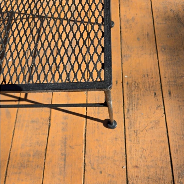 This iron coffee table is simple and traditional in its design, giving it a versatile style. It features welded seams and...