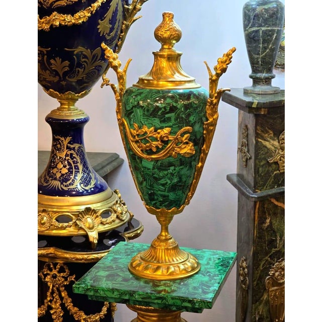This stunning French style porcelain vase features a beautiful marbleized finish in two elegant shades of green, creating...
