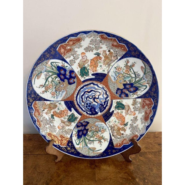 Quality antique Japanese imari charger having a quality antique Japanese imari charger decorated with panels of circular...