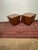 Elevate your space with bold geometry and rich woodgrain. This pair of vintage mahogany storage side tables offers a...