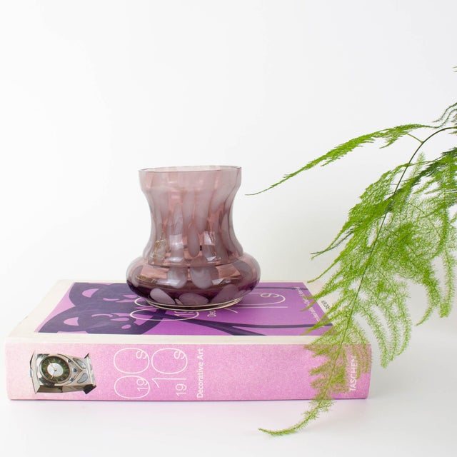 This elegant Portuguese hand-blown glass vase, produced in Marinha Grande during the 1960s, is a beautiful example of mid-...