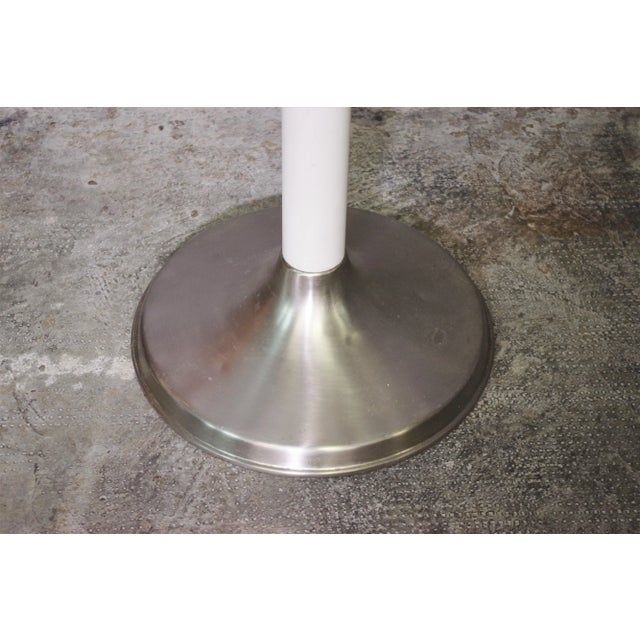 Column coat hanger in wood and metal base from the 70s.