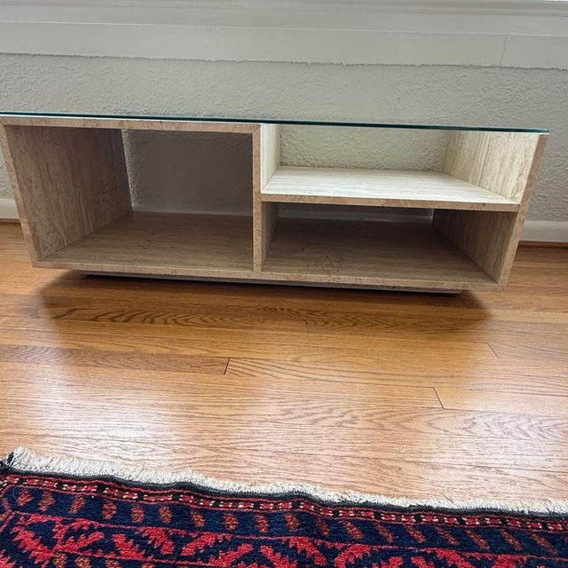 Open Frame Travertine Coffee Table This is a cool and unique piece. Crafted from travertine with an open frame and glass...