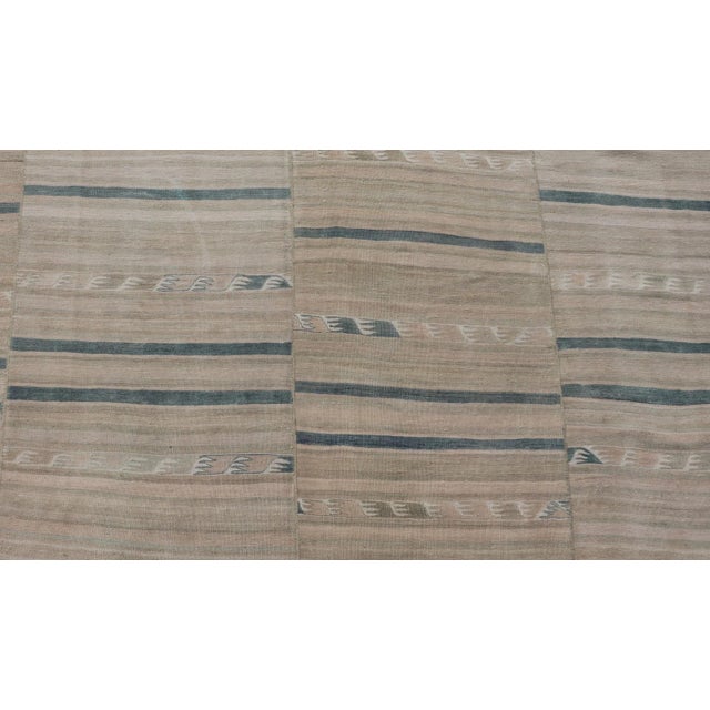 Mid 20th Century Turkish Vintage Paneled Kilim Vintage Rug in Muted Colors With Blue Highlights For Sale - Image 4 of 11