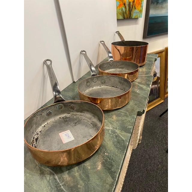 Set of French Four Copper Pots in Different Sizes, 19th Century. Professionally cleaned and polished in France. A light...