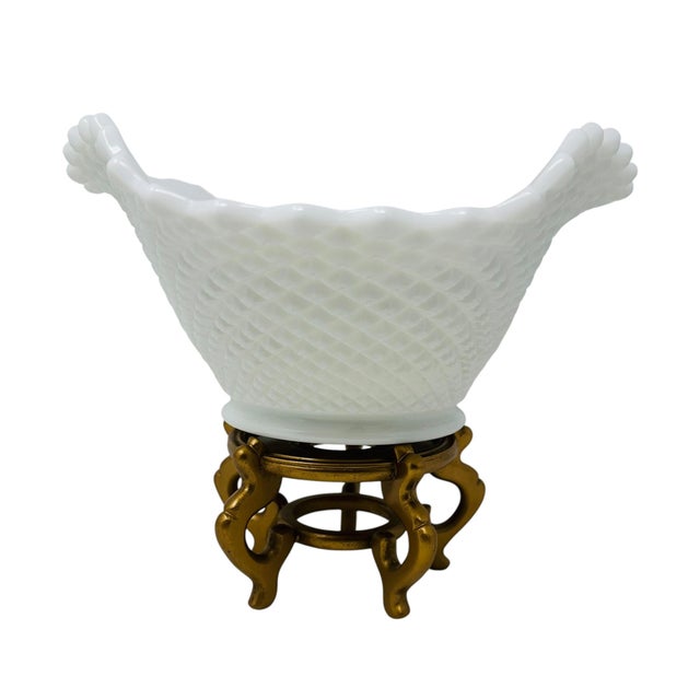 Add a touch of mid-century elegance to your home with this stunning statement centerpiece bowl from the Westmoreland Glass...