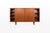 An elegant danish vintage highboard in teak by h.p. Hansen, featuring a softly rounded frame, recessed oval handles and...