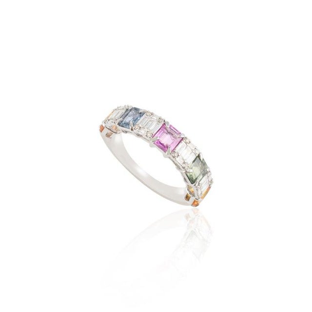 Genuine Multi Color Sapphires and Diamonds Band Ring in 18K Gold symbolizes the everlasting love between a couple. It...