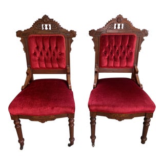Pair of Late 19th Century Eastlake Walnut Velvet Victorian Chairs with 2 Front Wheels For Sale