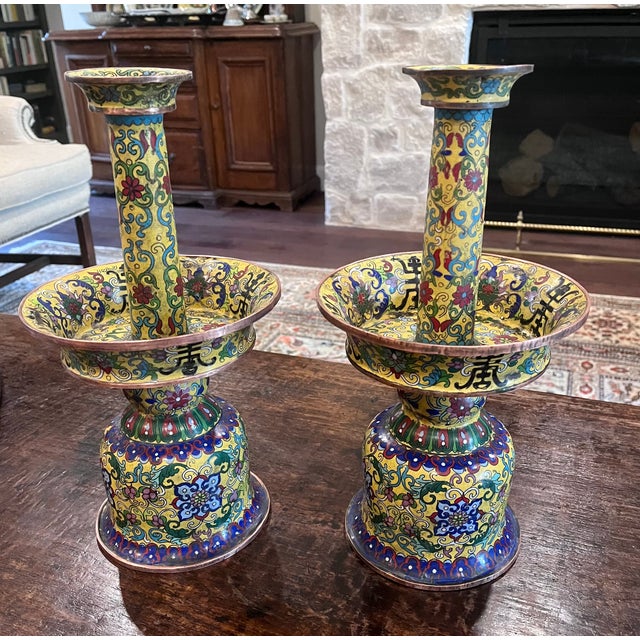 An exceptional, rare pair of late 19th-century Chinese Qing Dynasty cloisonné (champlevé) enamel on copper pricket candle...