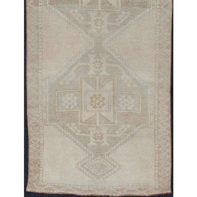 Tribal Vintage Turkish Hand Knotted Oushak Runner With Etched Medallion Design in Soft Muted Tones For Sale - Image 3 of 13