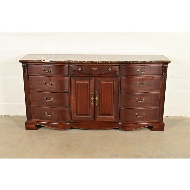 A beautiful French Empire or Louis Philippe style twelve-drawer triple dresser or credenza By Thomasville, "Ernest...