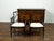 A pair of vintage Chinese Chippendale style black faux bamboo armchairs from the mid 20th century, with new upholstery....