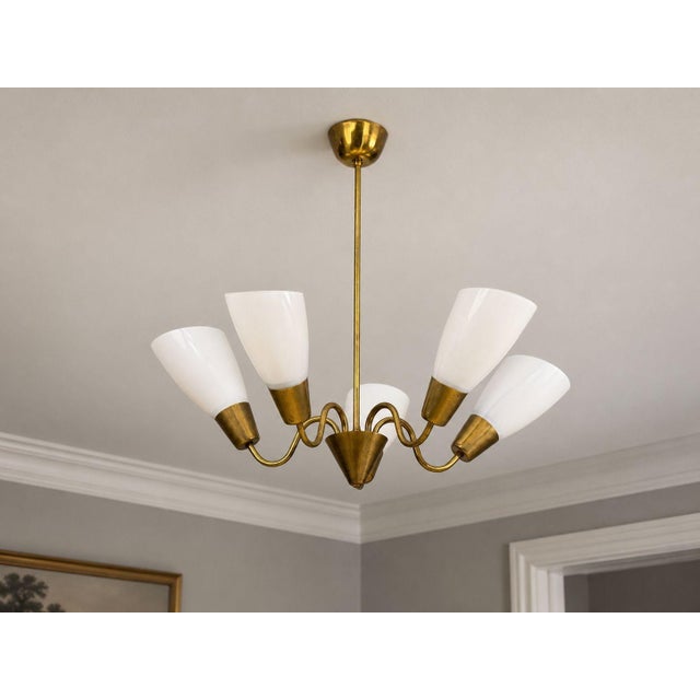 Itsu, Finnish Mid-Century Modern, Chandelier, Brass, Glass, Finland, 1940s A large model ER133/5 chandelier designed and...
