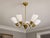 Itsu, Finnish Mid-Century Modern, Chandelier, Brass, Glass, Finland, 1940s A large model ER133/5 chandelier designed and...