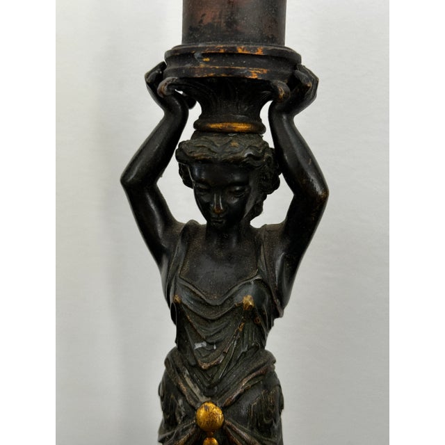 Pair of Antique Figurative Metal Candlesticks on wood bases