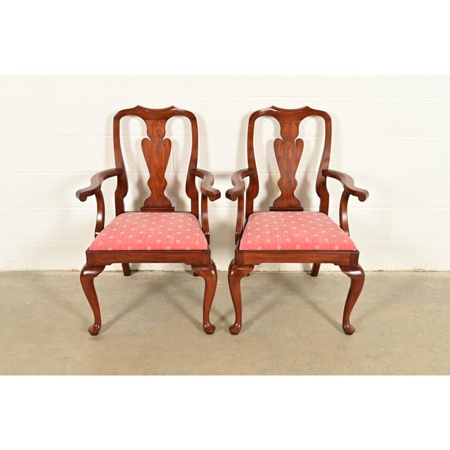 An outstanding pair of Queen Anne or Georgian style armchairs or dining captain chairs By Henkel Harris USA, Circa 1970s...