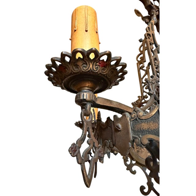 A great chandelier with original patina. Perfect over a dining room table, master bedroom lighting as well. Wired to UL...