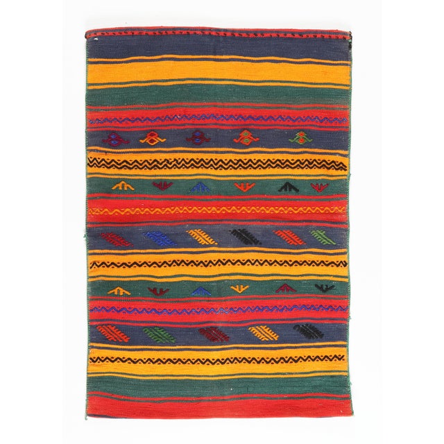 This is a vintage saddlebag that can be used as a decorative piece or rug. The piece is from Sivas City. The piece was...