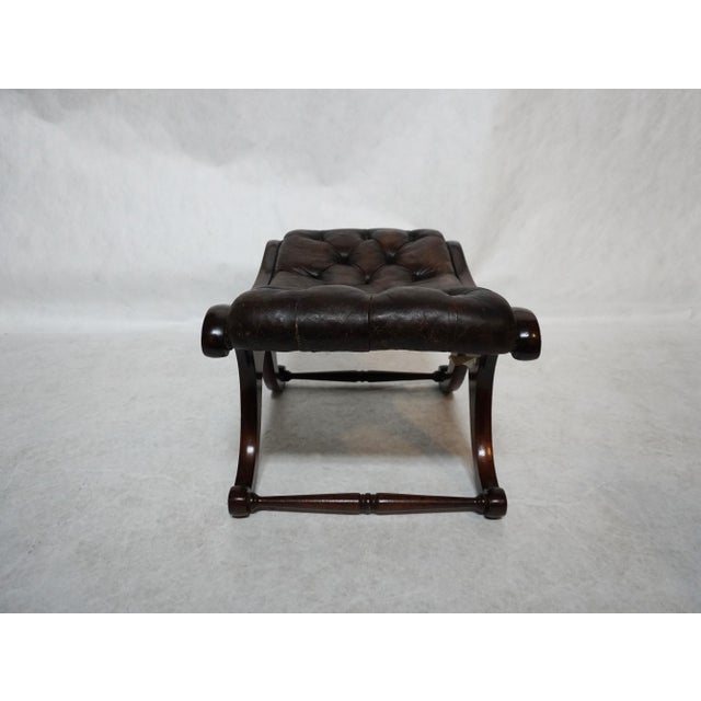 Brown Leather Chesterfield Tufted Stool Wood double "C" frame stool. Rectangular top with a tufted dark brown leather seat...